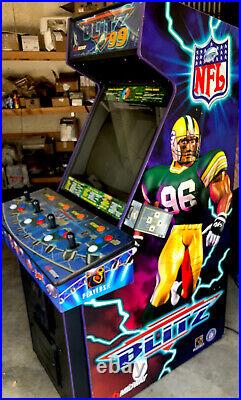 NFL BLITZ 99 ARCADE MACHINE by MIDWAY with Nintendo 64 extension Great Condition
